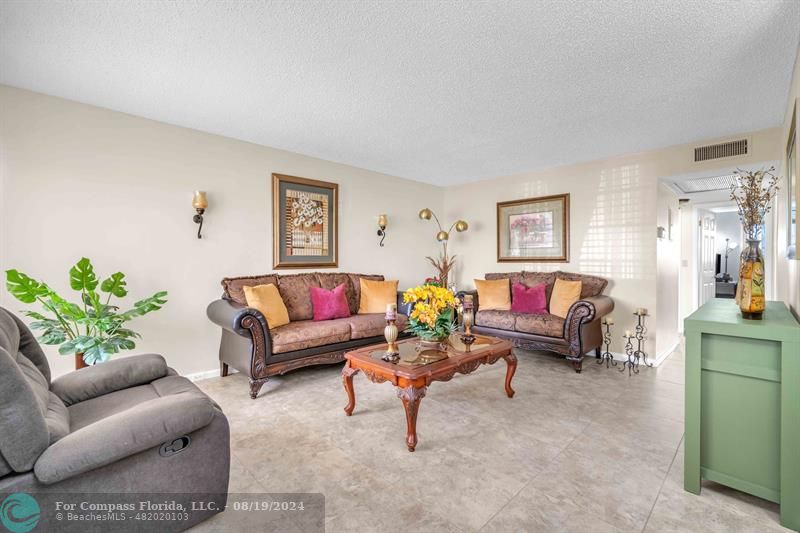 a living room with furniture and a couch