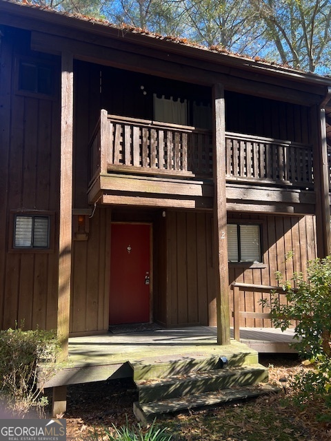 a front view of a house with a balcony