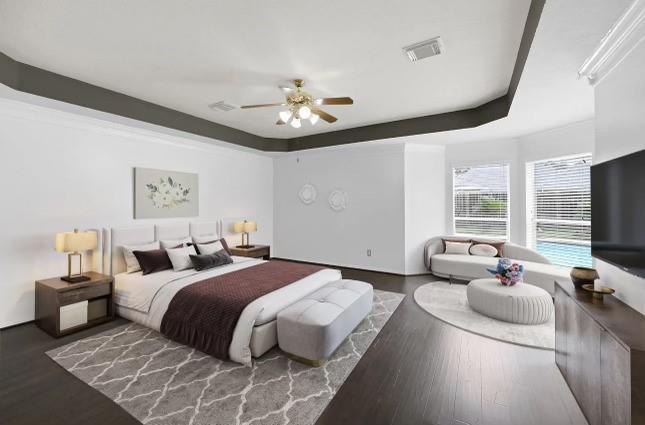 a spacious bedroom with a bed and glass door