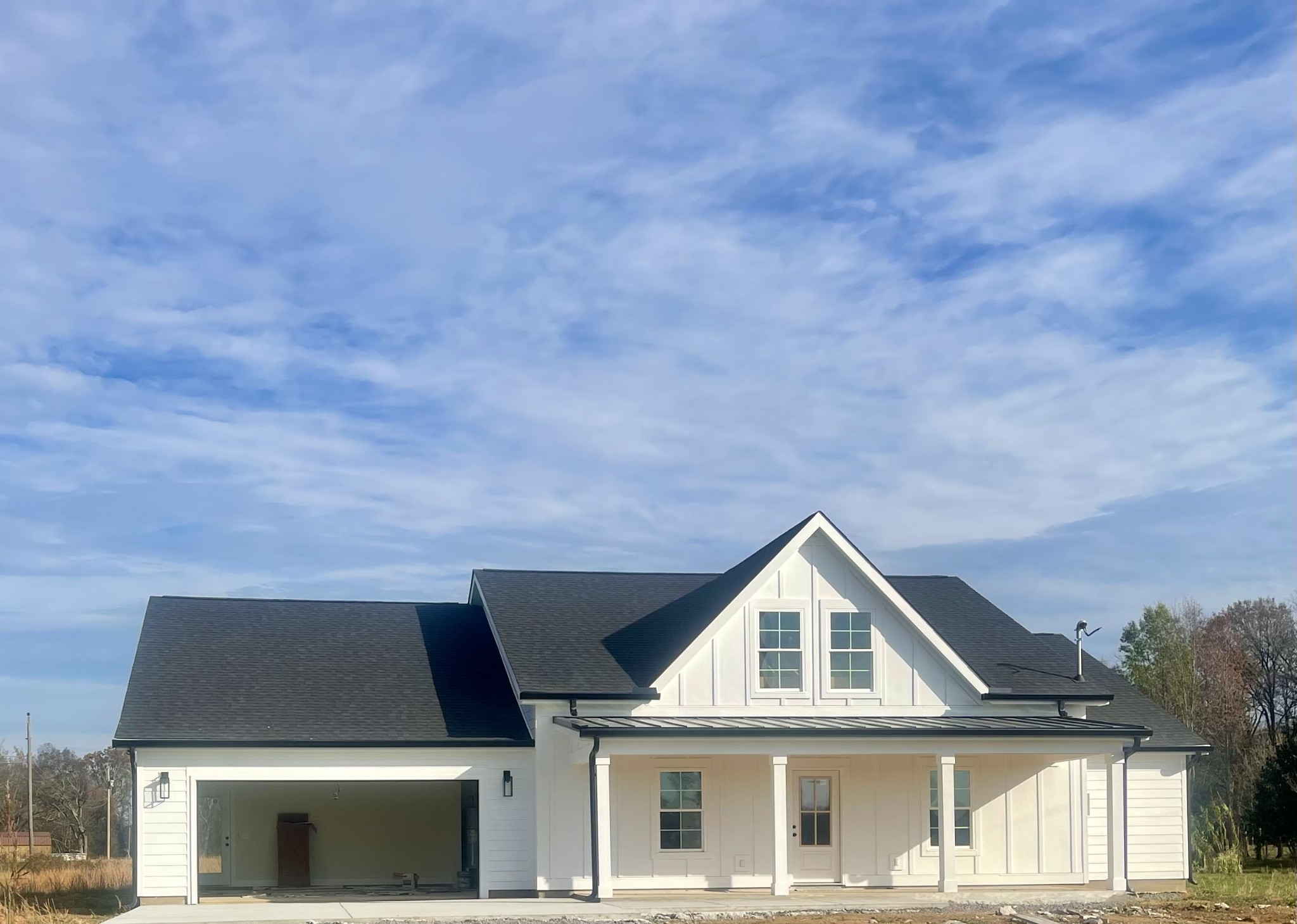 a view of house with yard