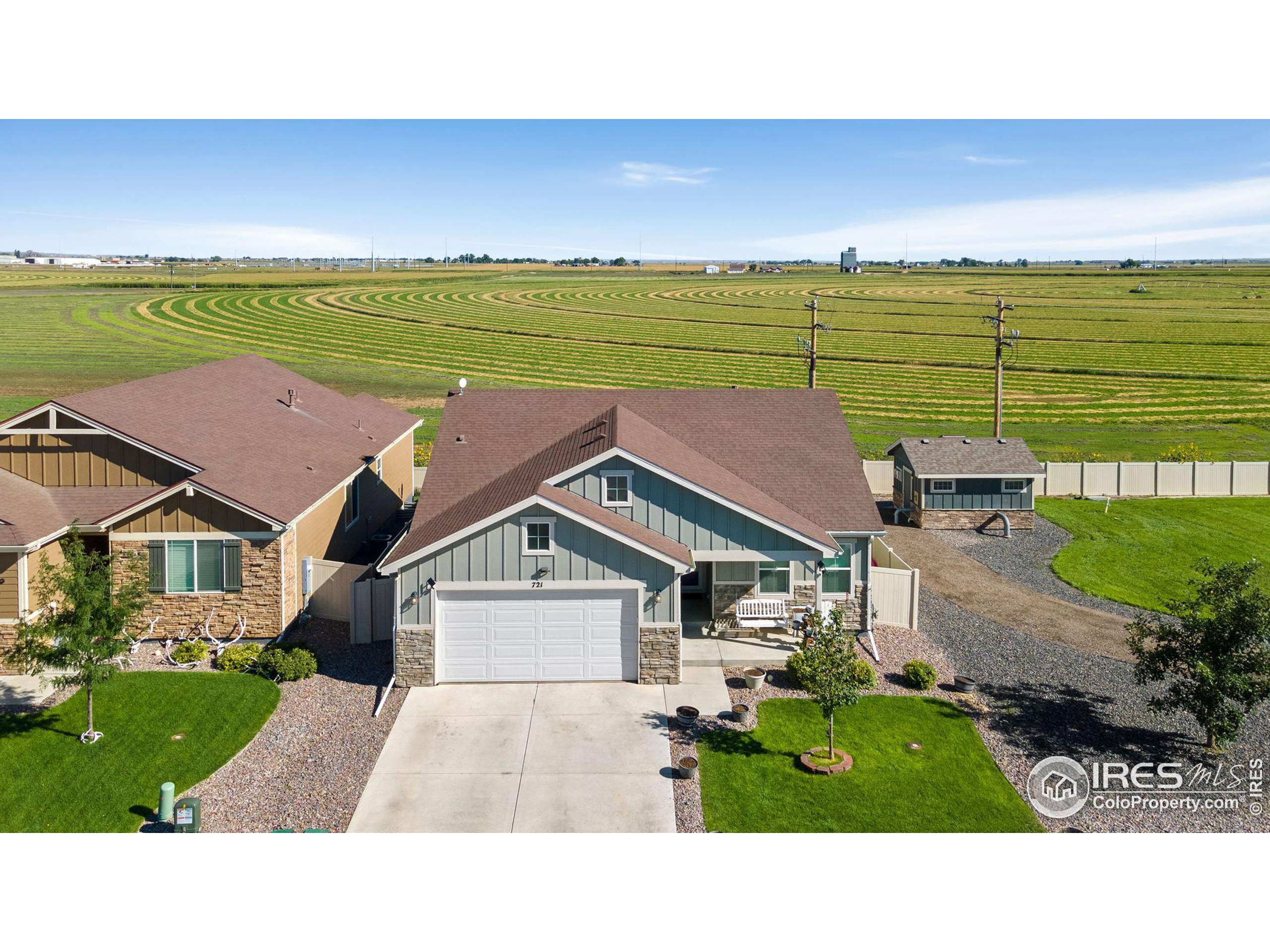 a aerial view of a house with a garden