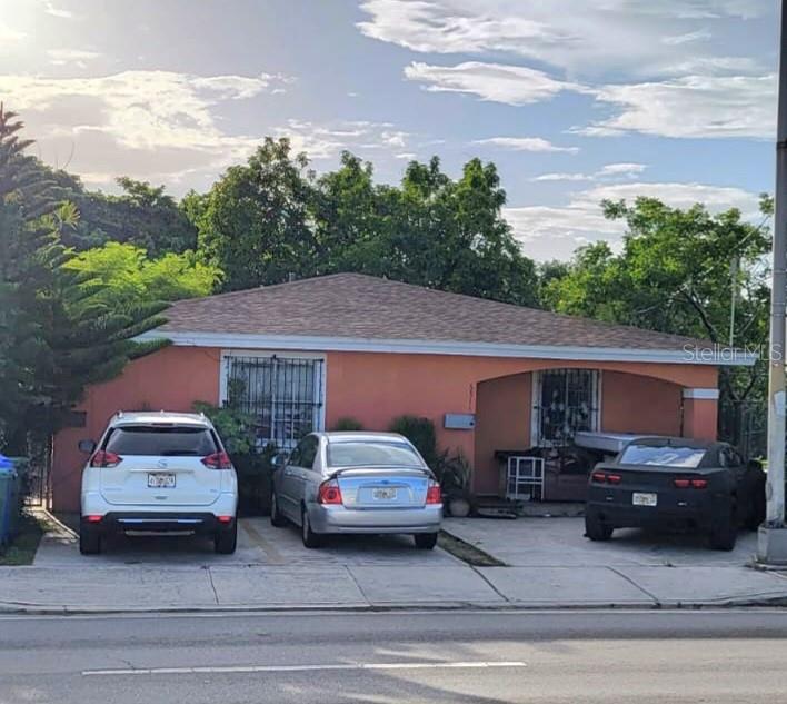 a car parked in front of a house