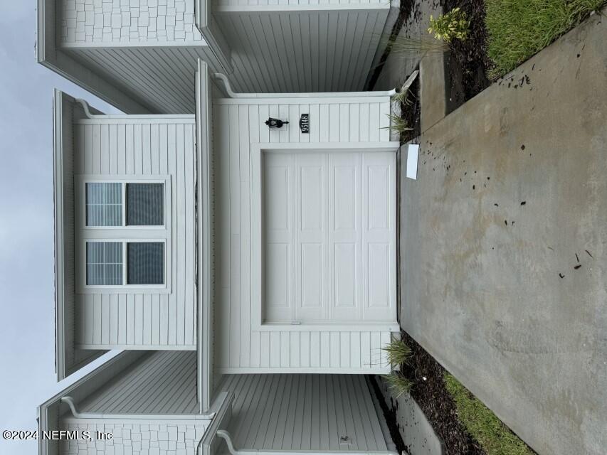 a view of a house with garage