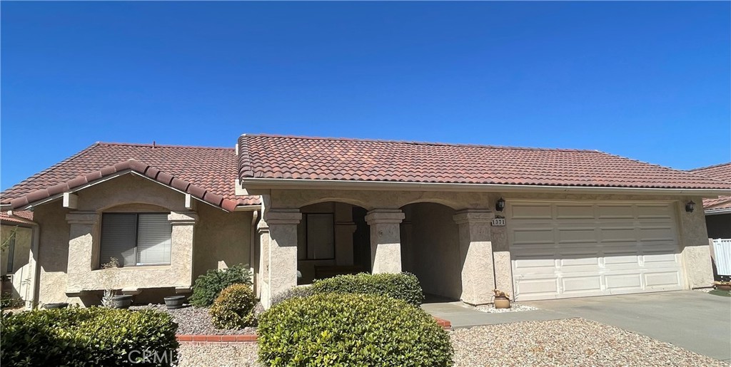 a view of a house with a garage