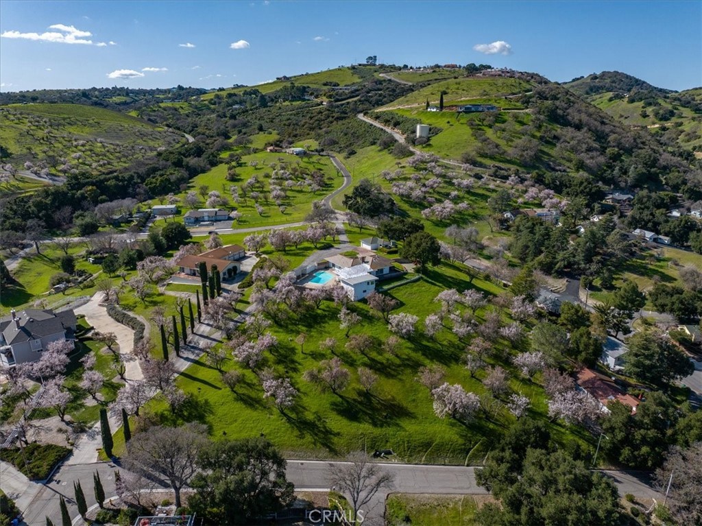 a view of a big yard with green space