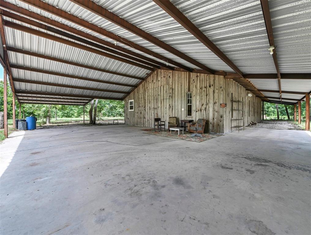 Home with oversized wrap around covered patio.