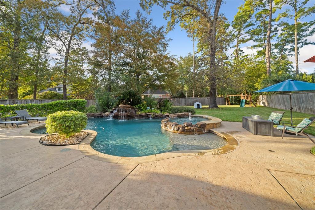 a view of a garden with an outdoor space