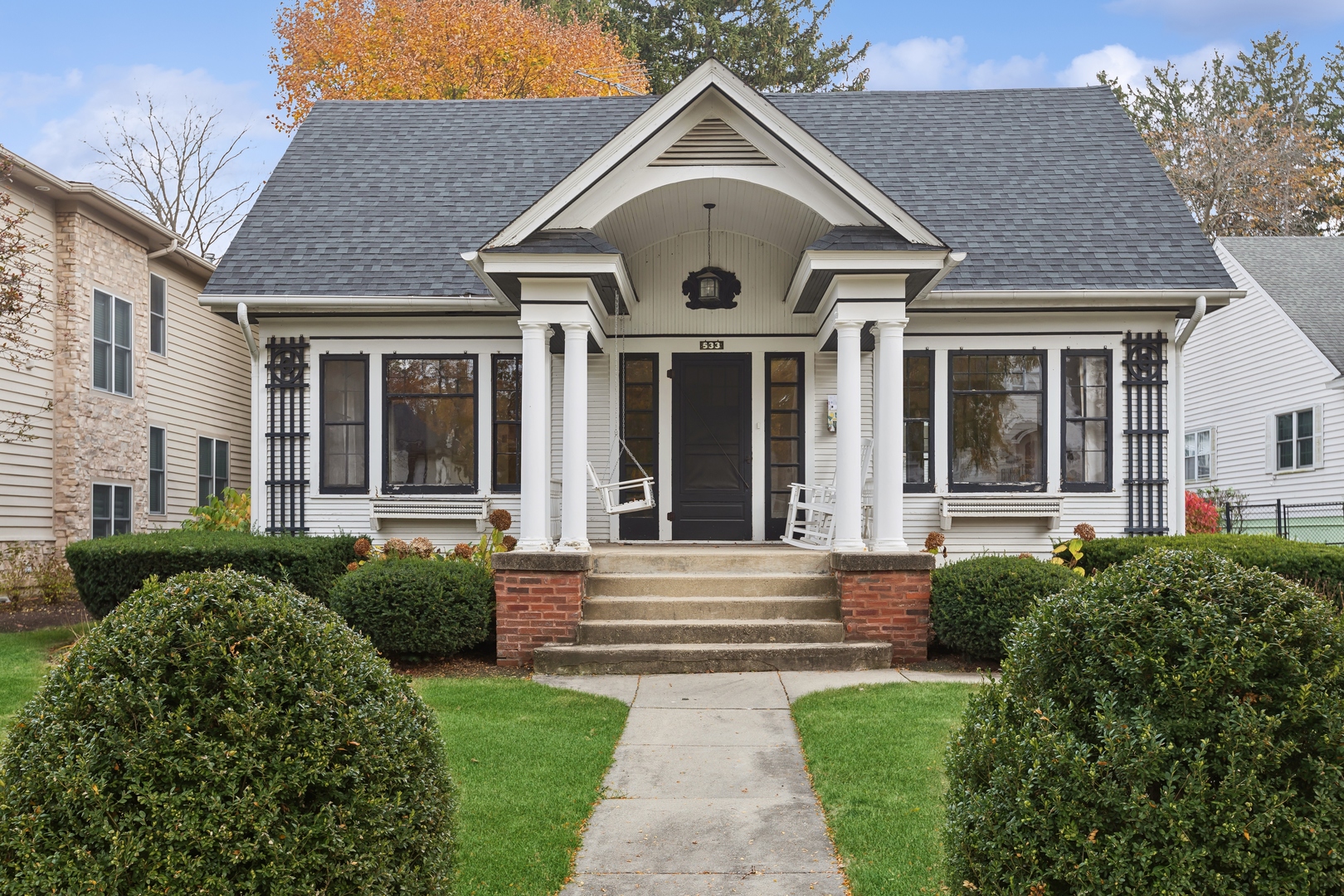 a front view of a house with a yard