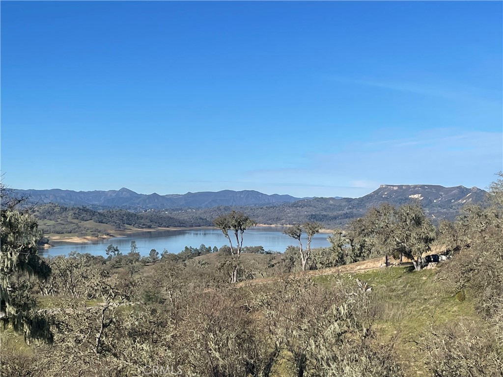 a view of mountain with lake view