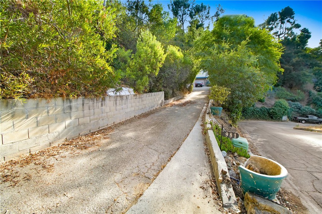 a view of a pathway with a patio