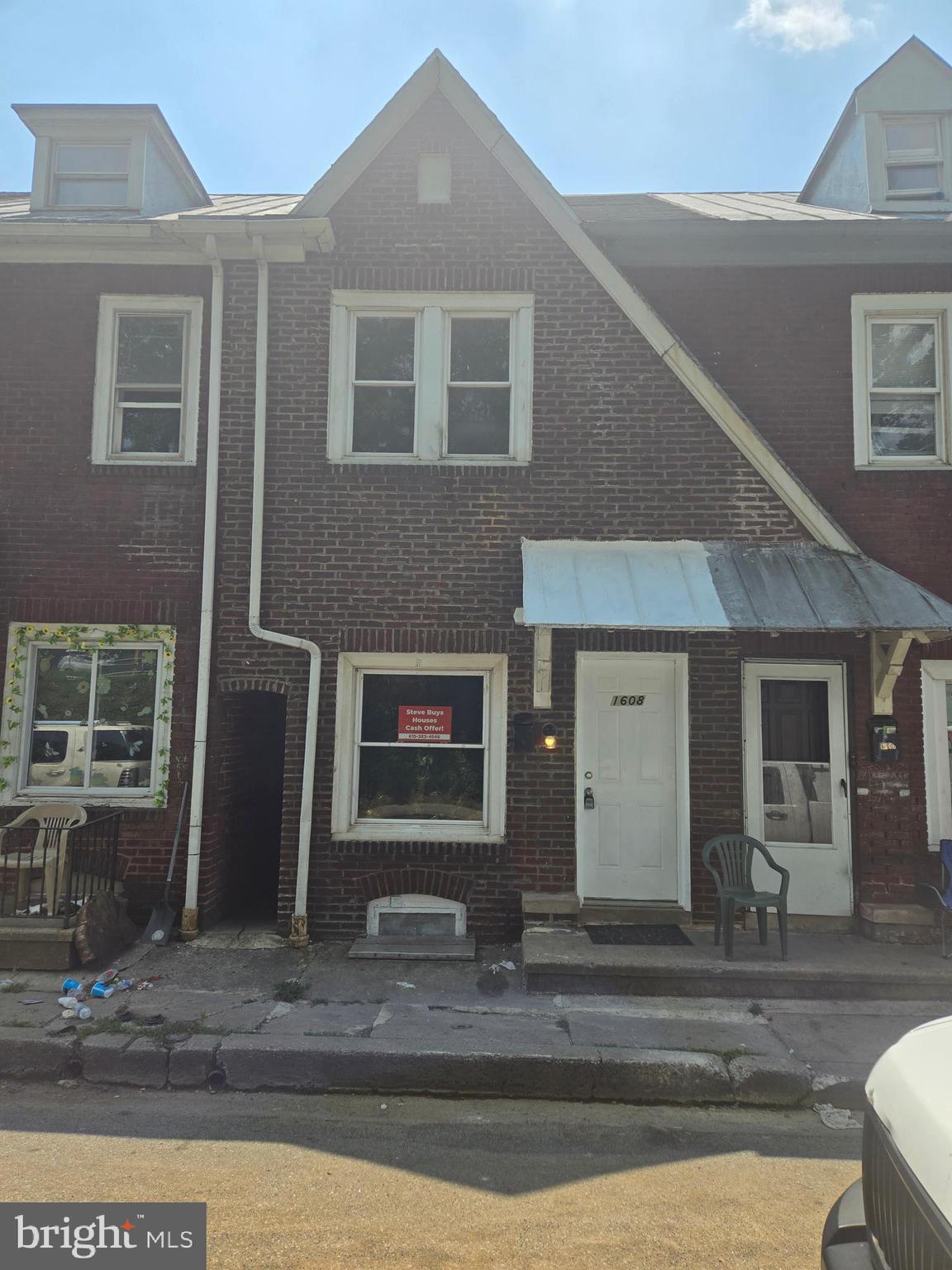 a front view of a house with garage