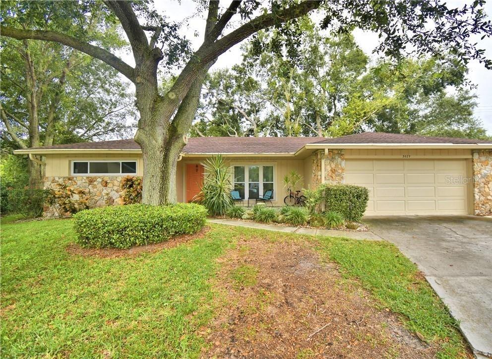 front view of a house with a yard