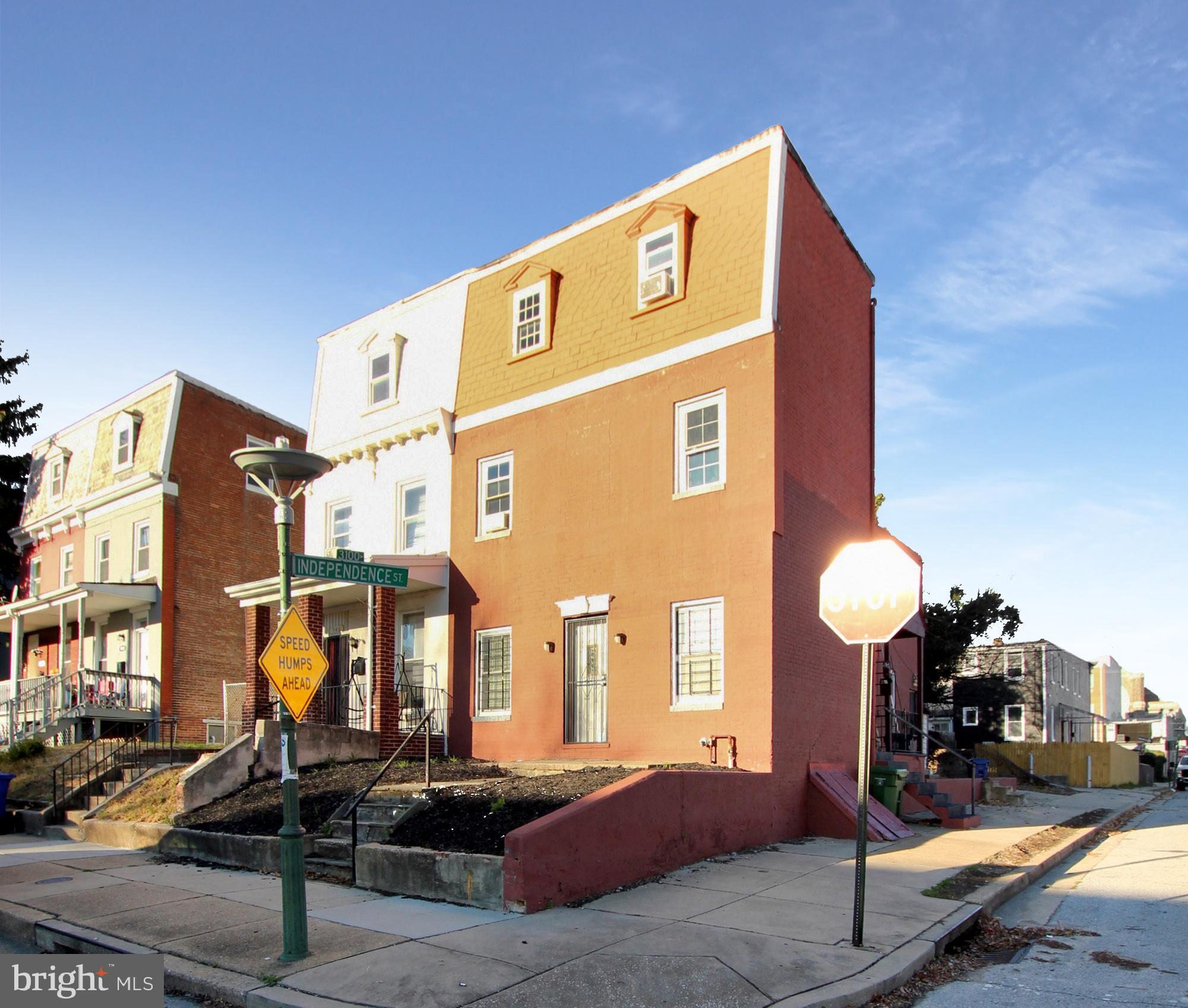 a front view of a building with street view