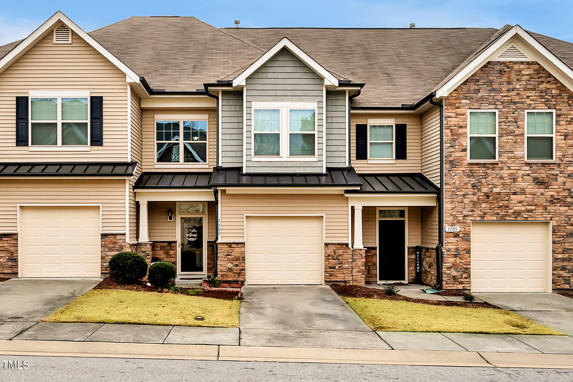 a view of house with yard