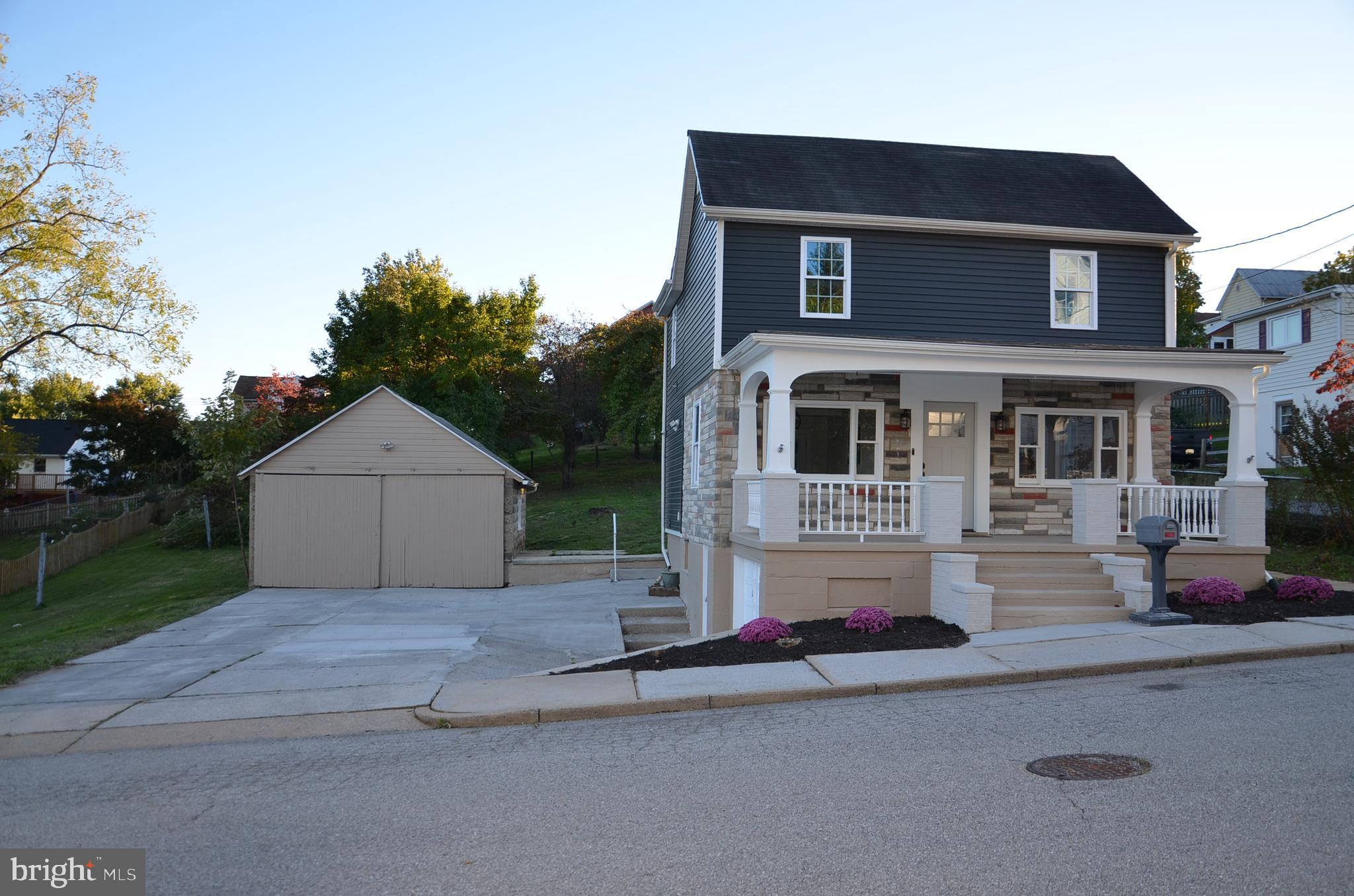 a front view of house with yard