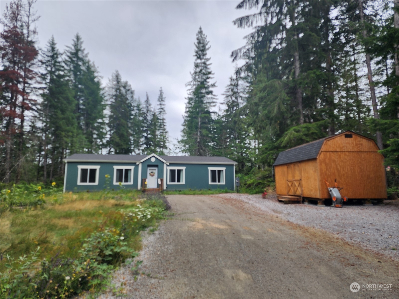 a house with trees in the background