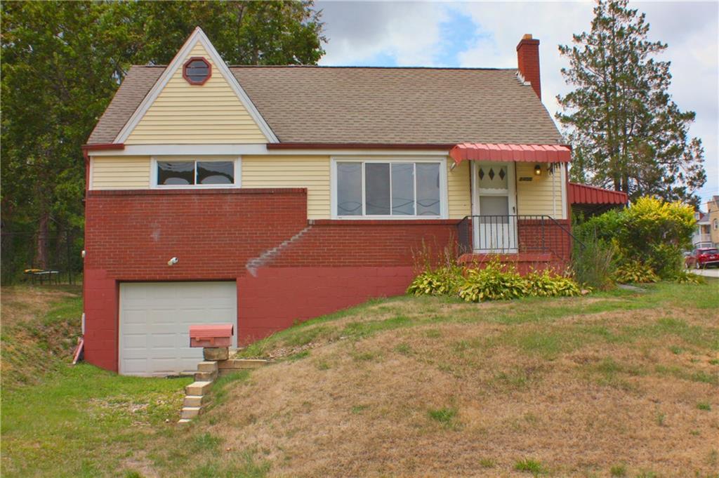 a front view of house with yard