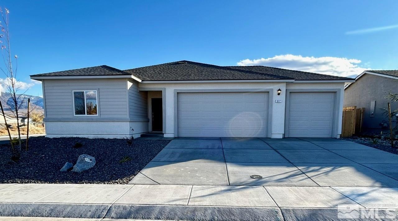 a front view of a house with yard