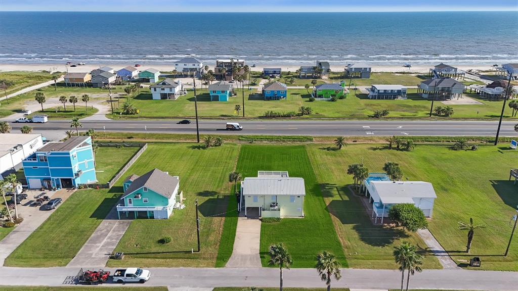 an aerial view of a houses with outdoor space