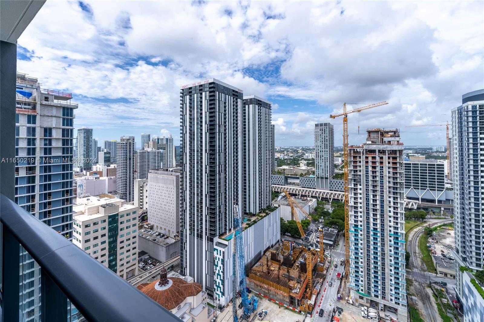 a city view from a balcony