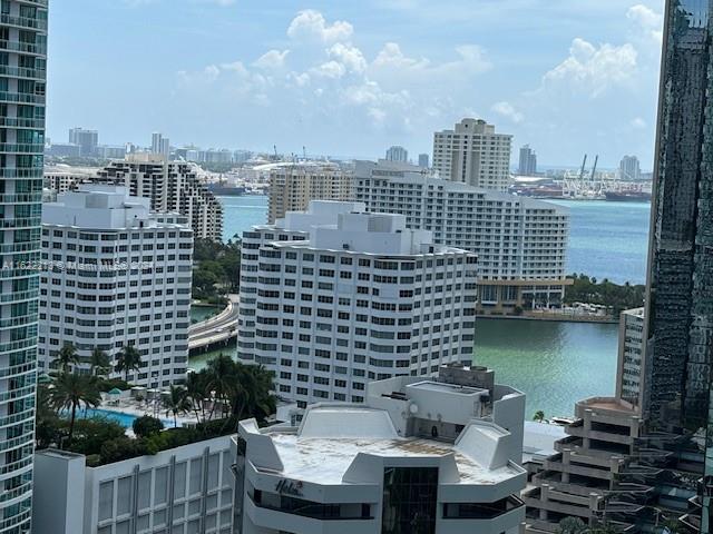 a balcony with a city view