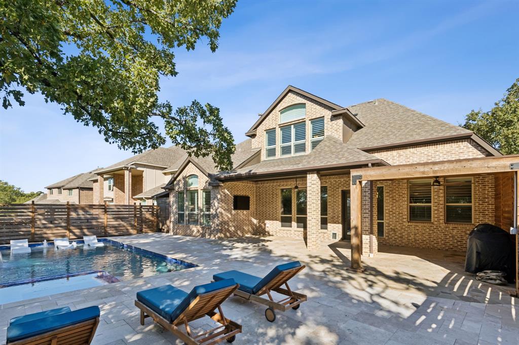 a front view of house with yard and seating area