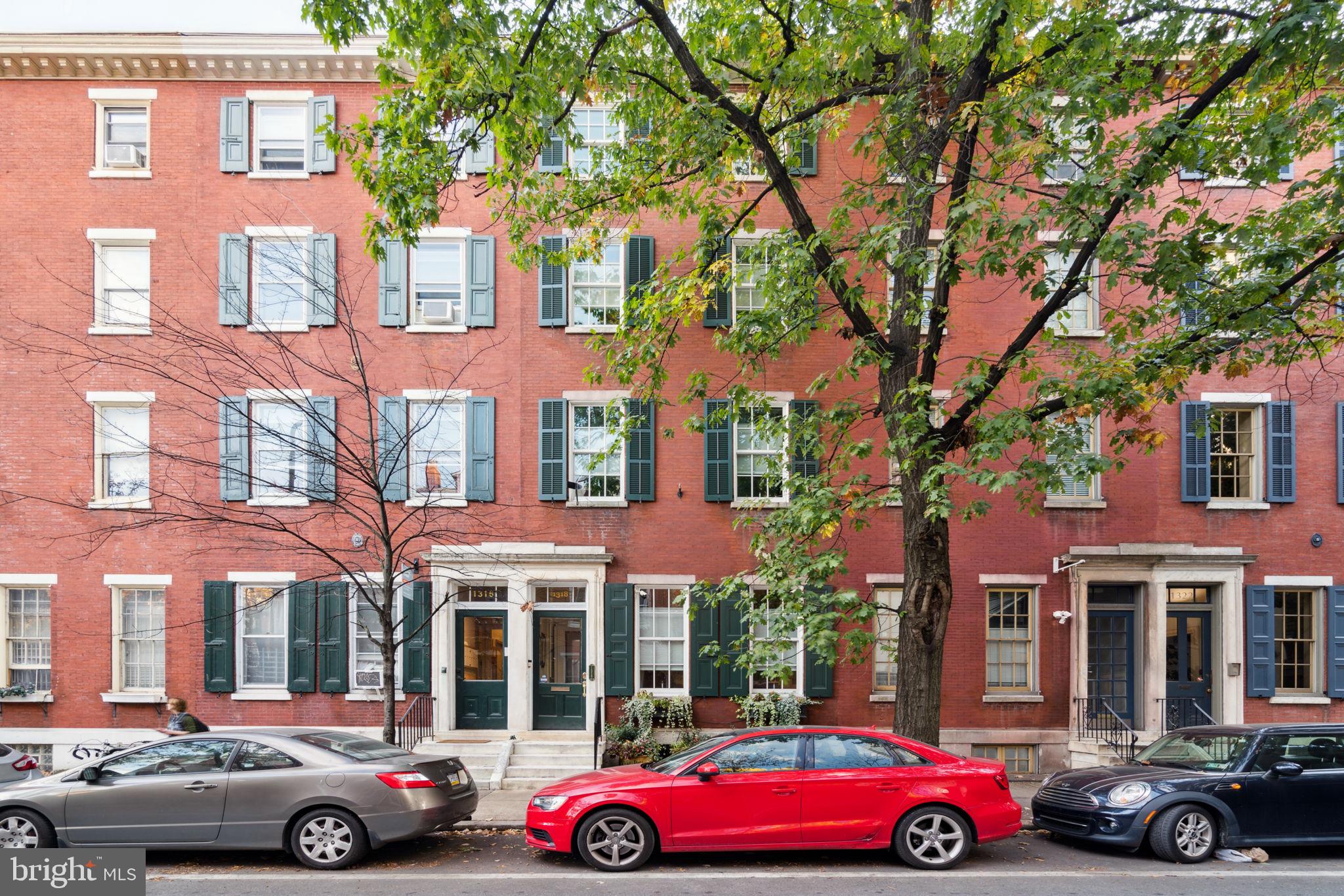 a cars parked in front of a building