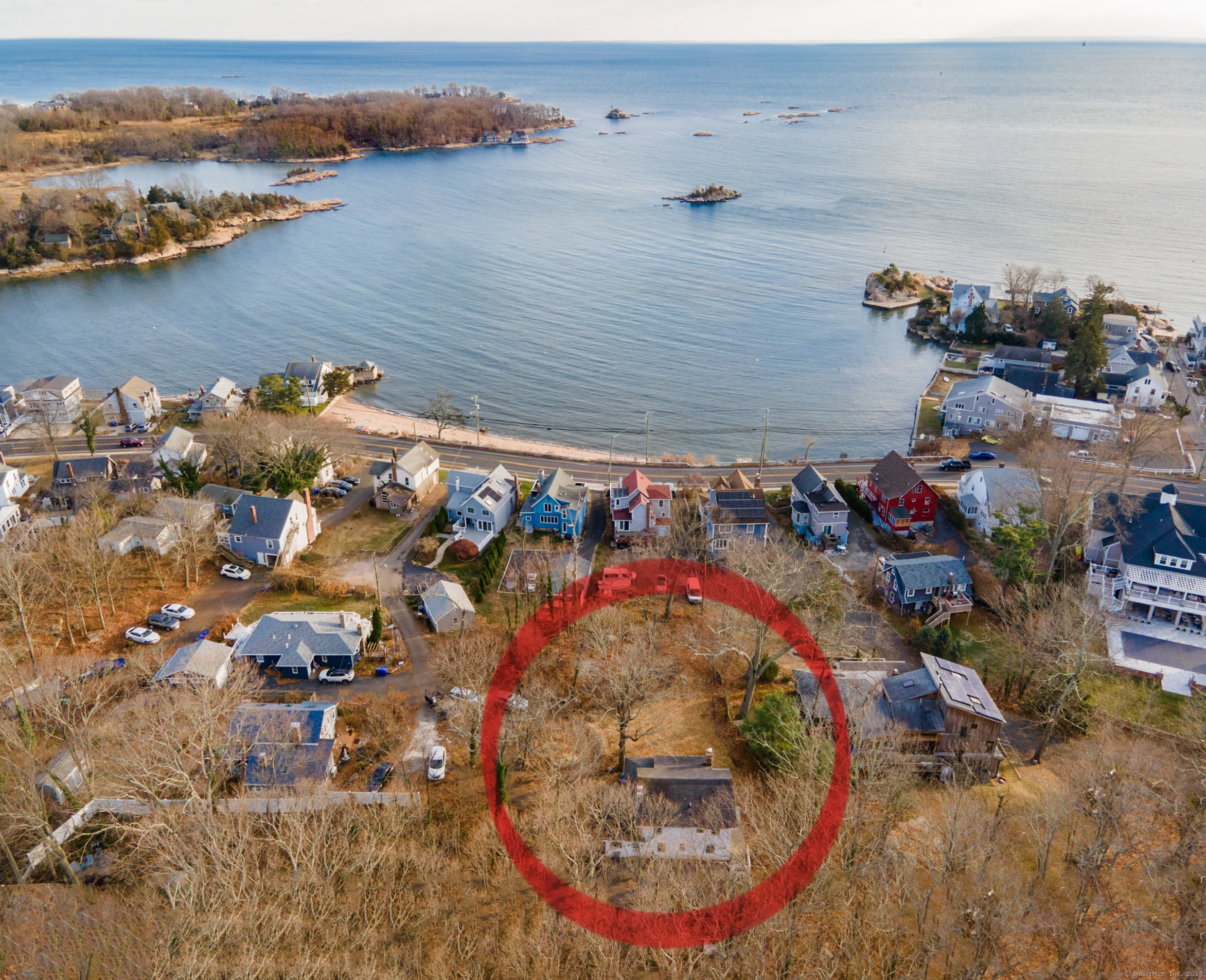 an aerial view of a house with outdoor space