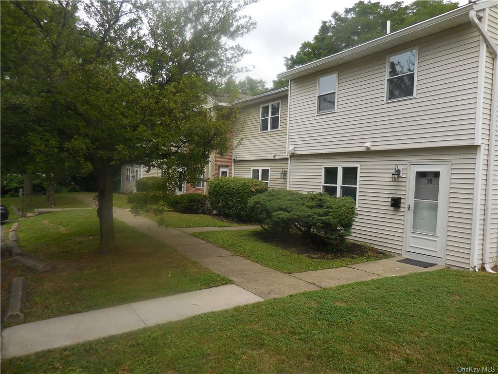 View of front of home with a front yard