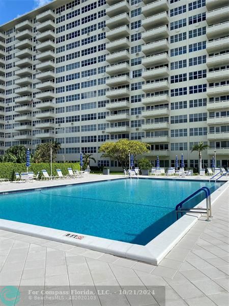 a view of swimming pool with outdoor space