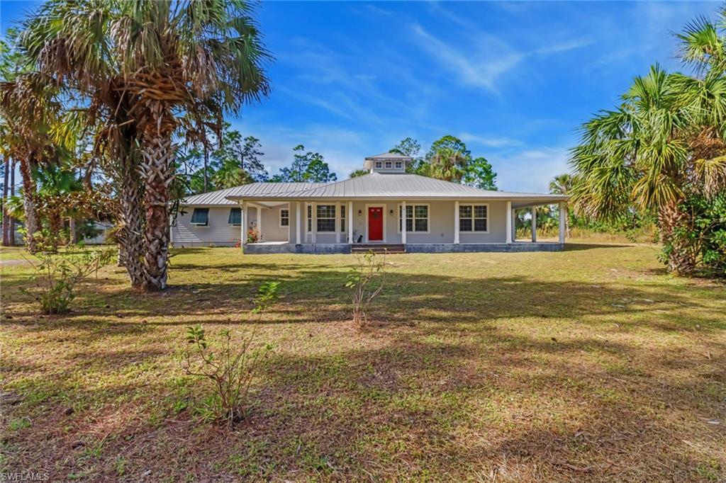 a view of a house with a ocean view