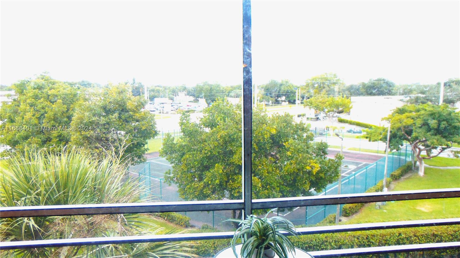 a view of a city skyline from a balcony