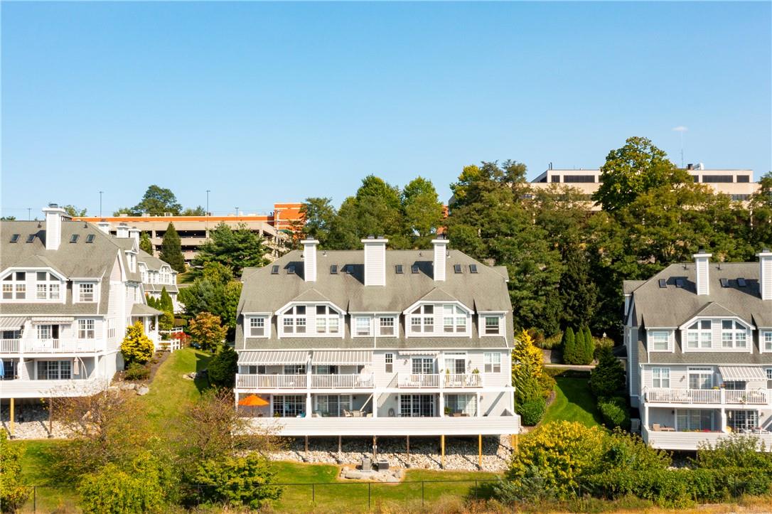 a view of a large building with a garden