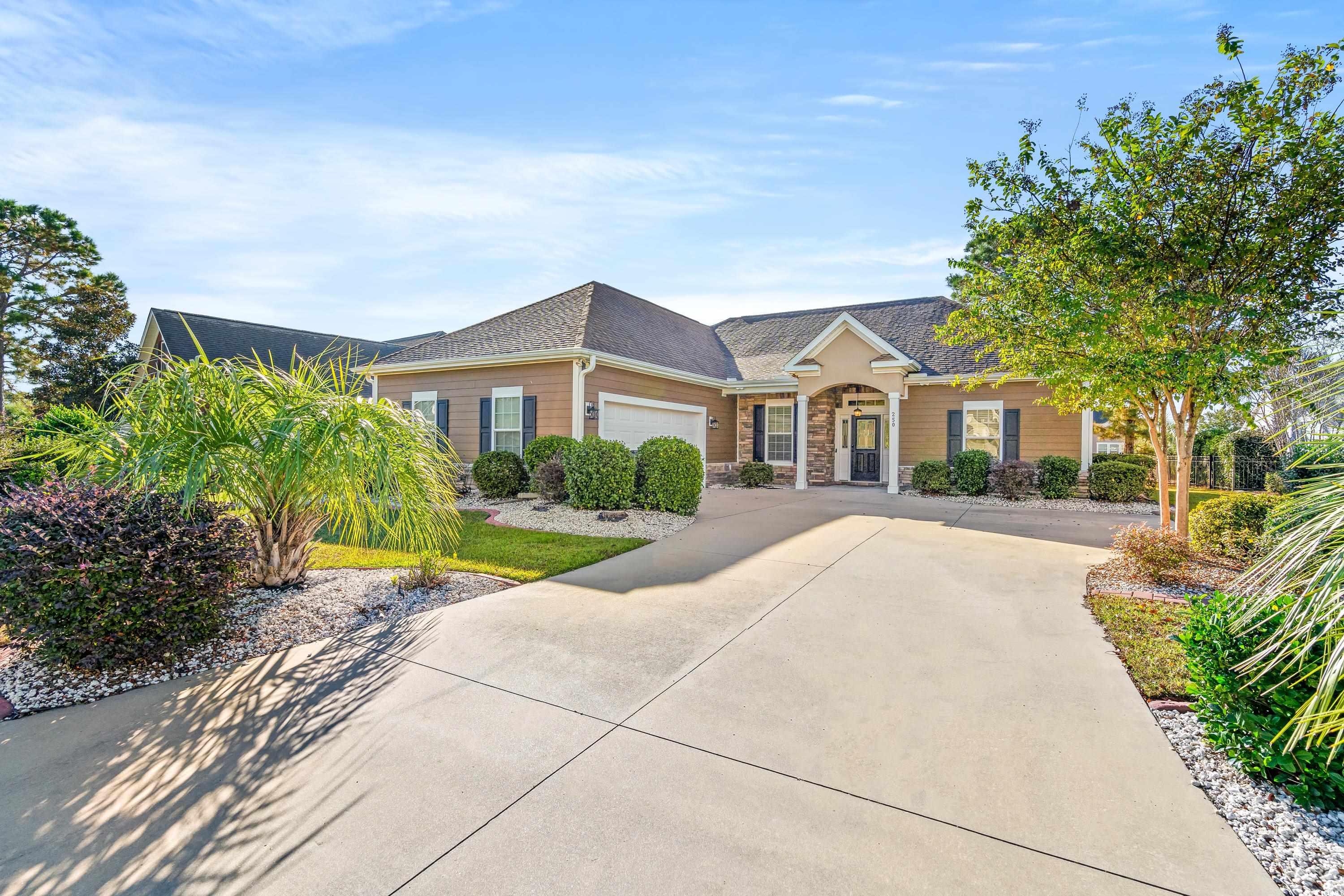 Single story home with a garage