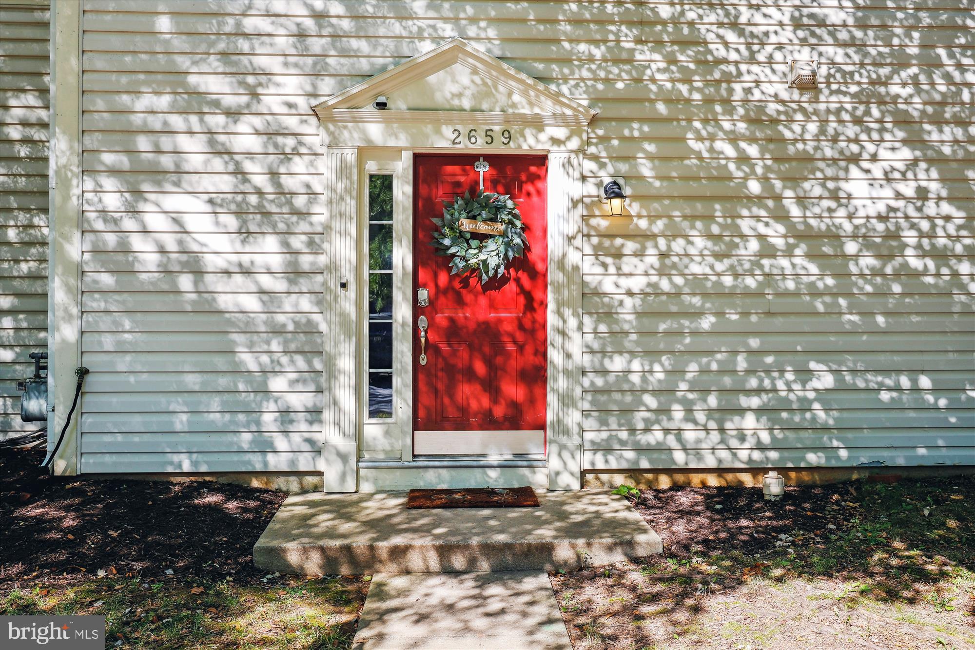 a view of a brick house with a door