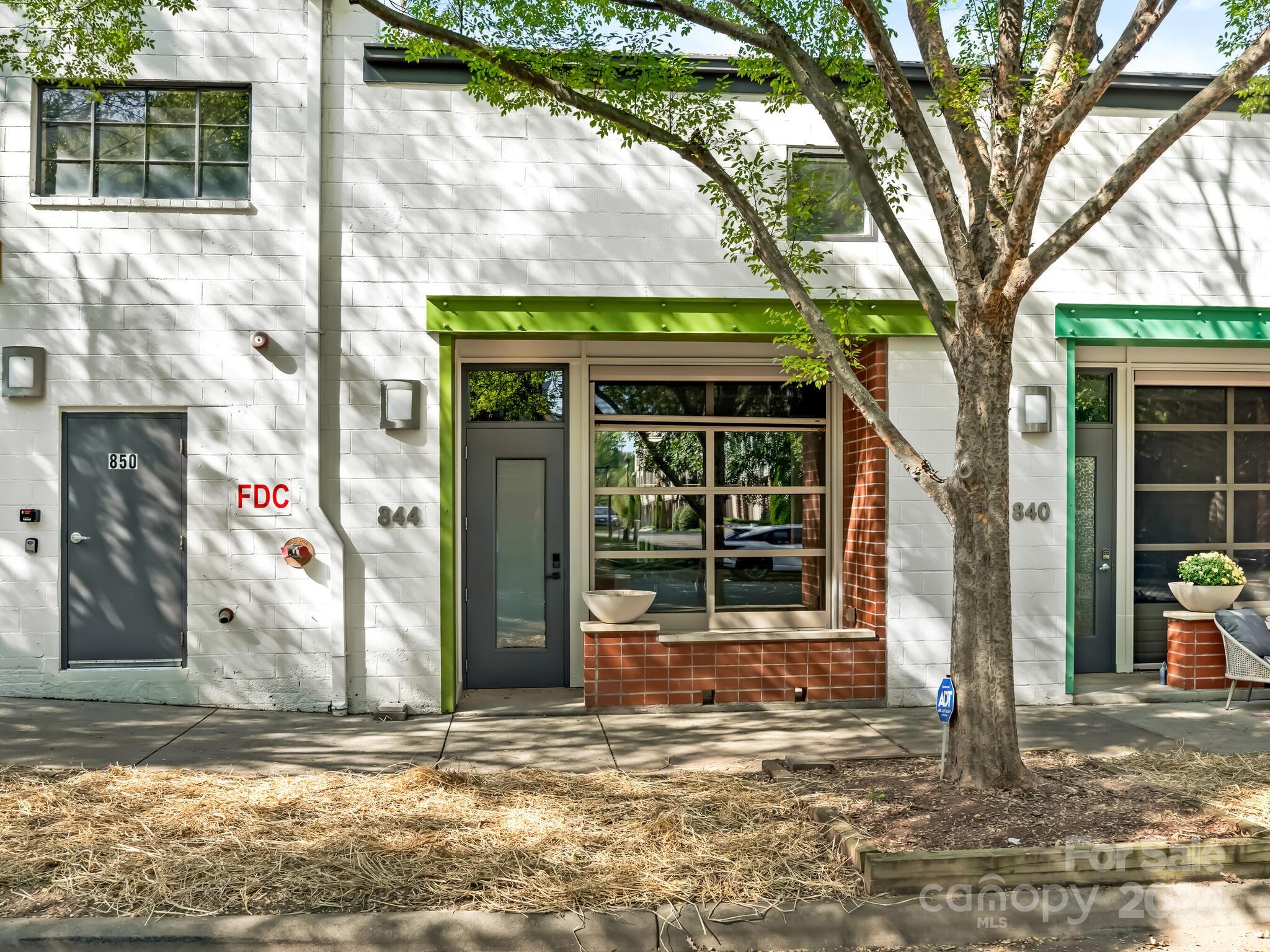 a house with trees in front of it