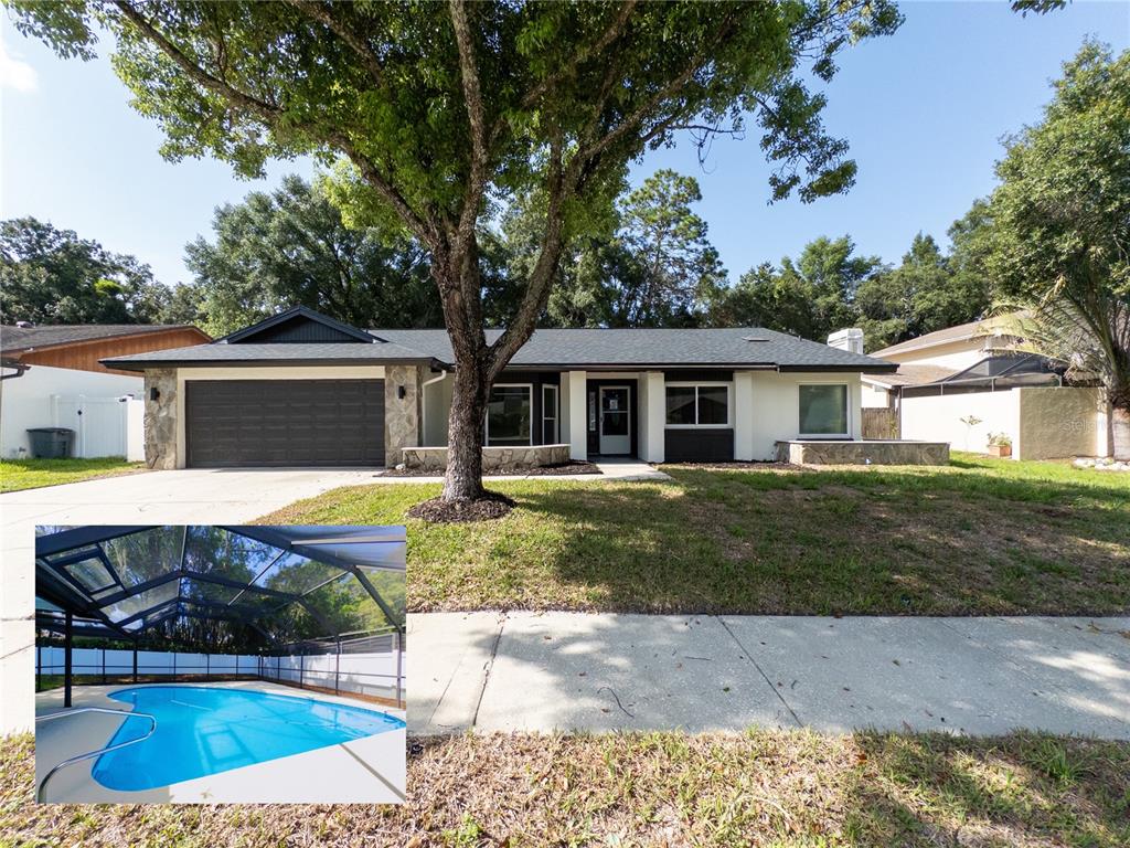 a view of house with swimming pool outdoor seating