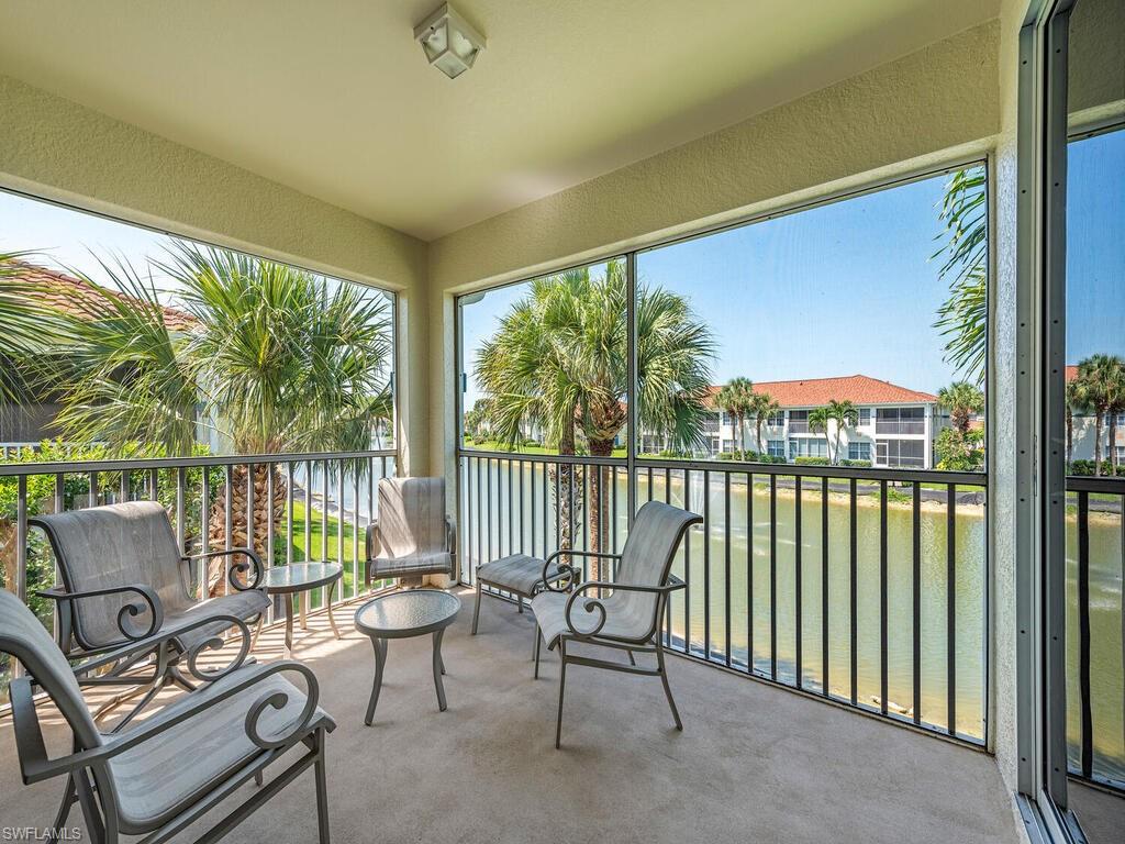 a balcony with chairs