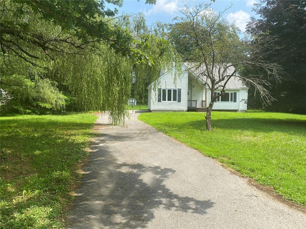 View of front of house with a front lawn