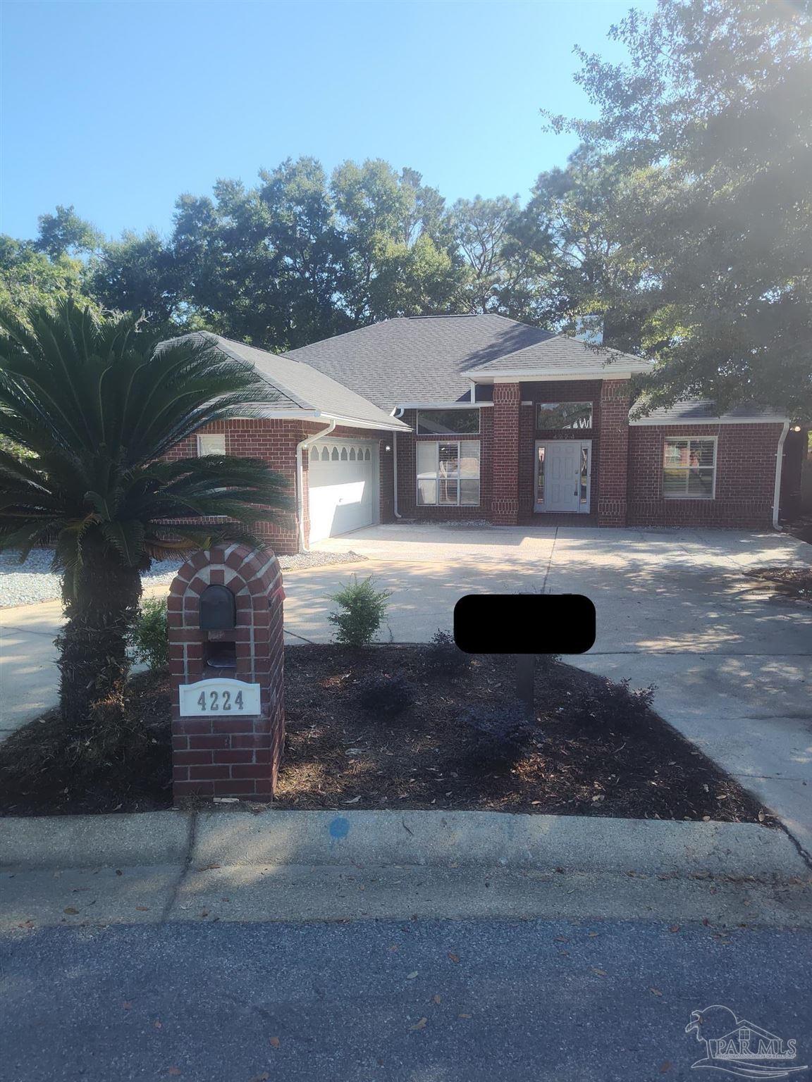 a view of house with outdoor space