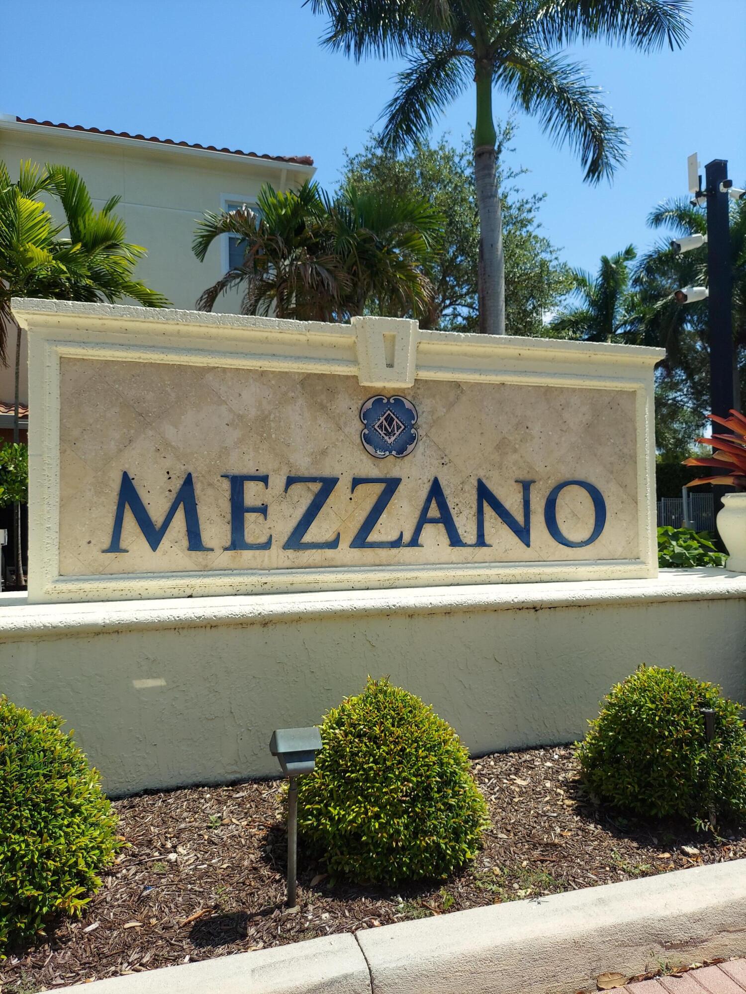 a view of a street sign under an umbrella