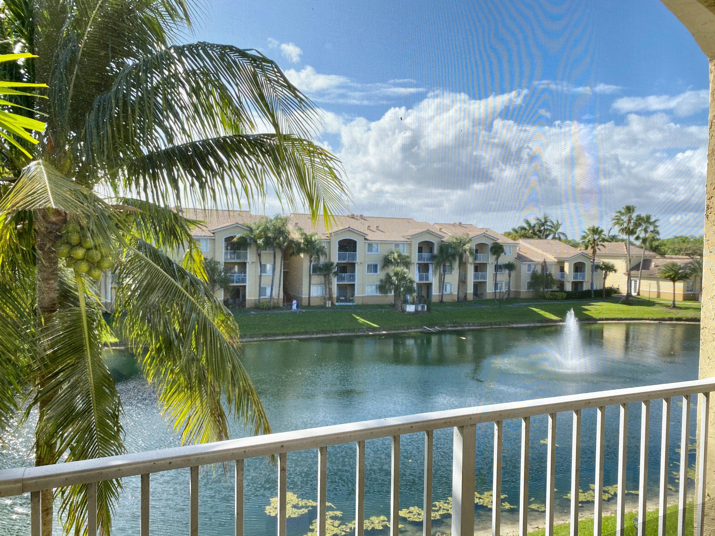 a view of a lake from a balcony