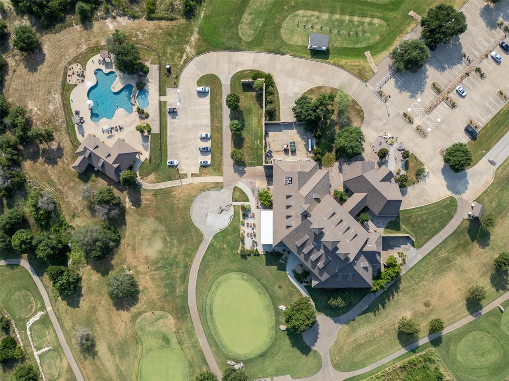 an aerial view of a house with outdoor space