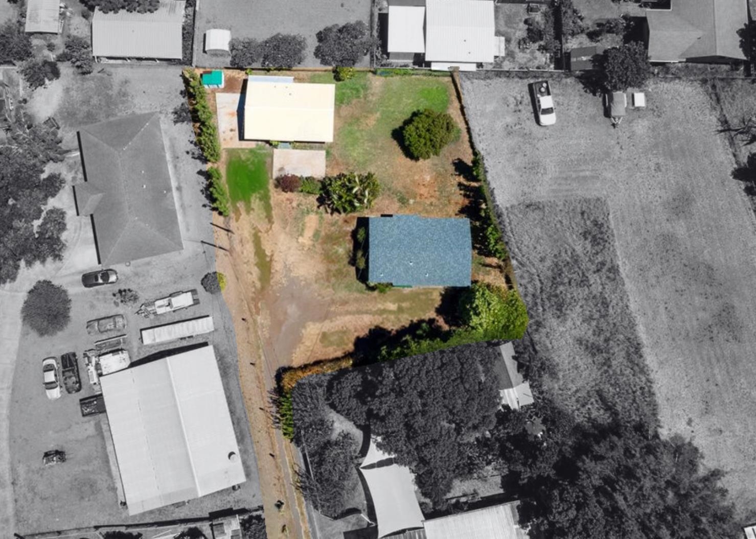 an aerial view of residential house with outdoor space