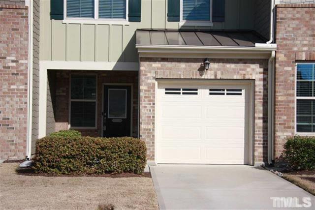 front view of a house with a small yard