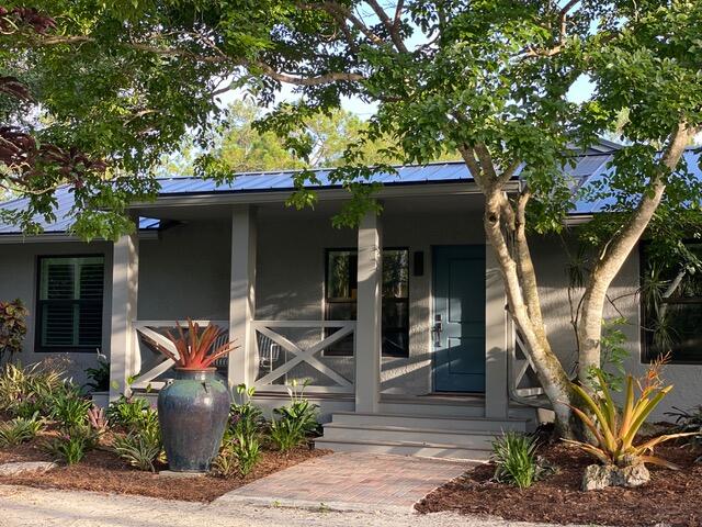 a front view of a house with porch