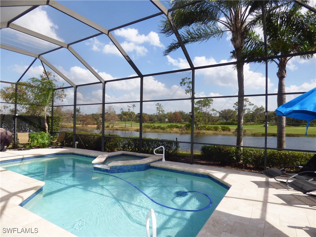 a view of a swimming pool with a sitting space