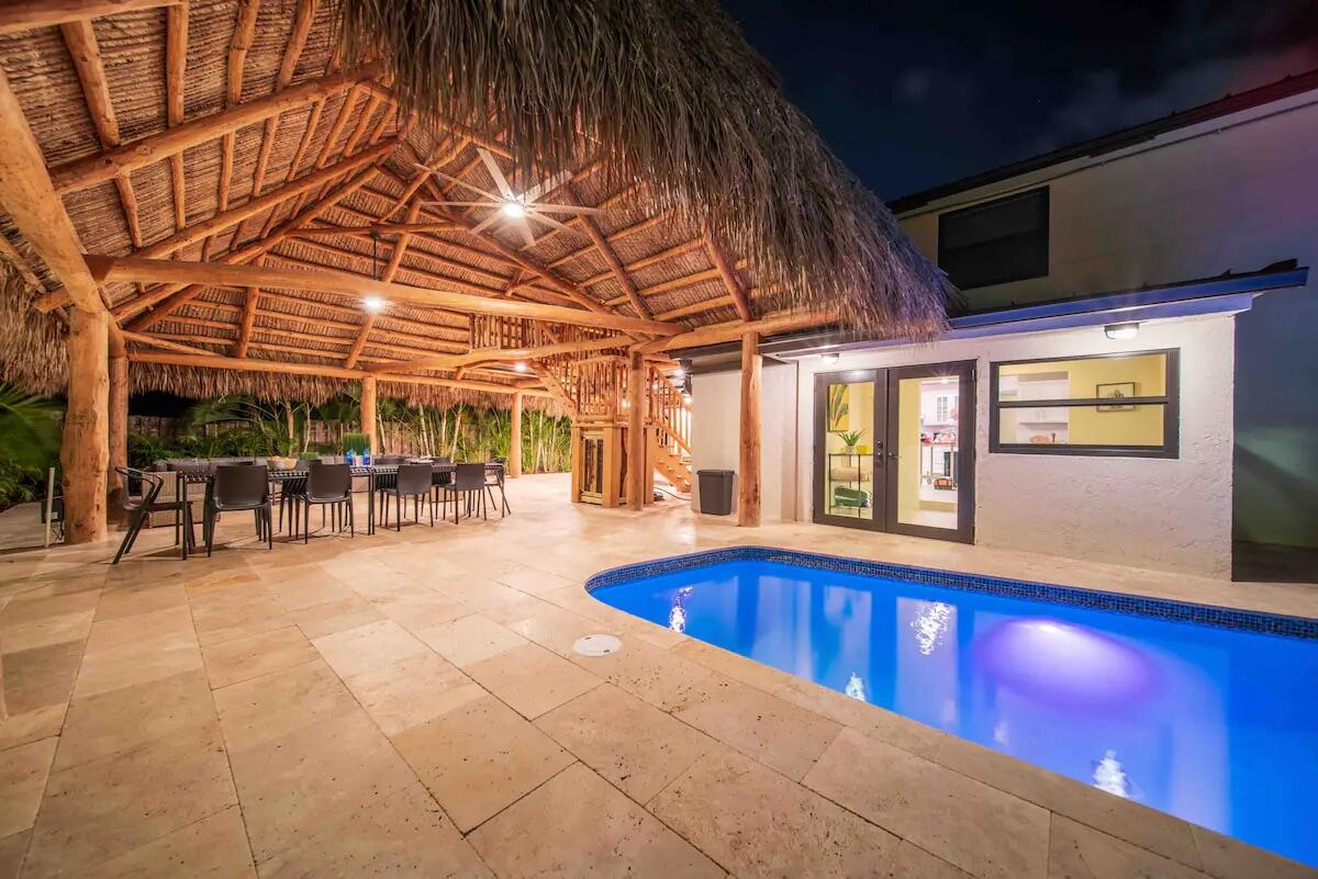 a view of a swimming pool with a patio