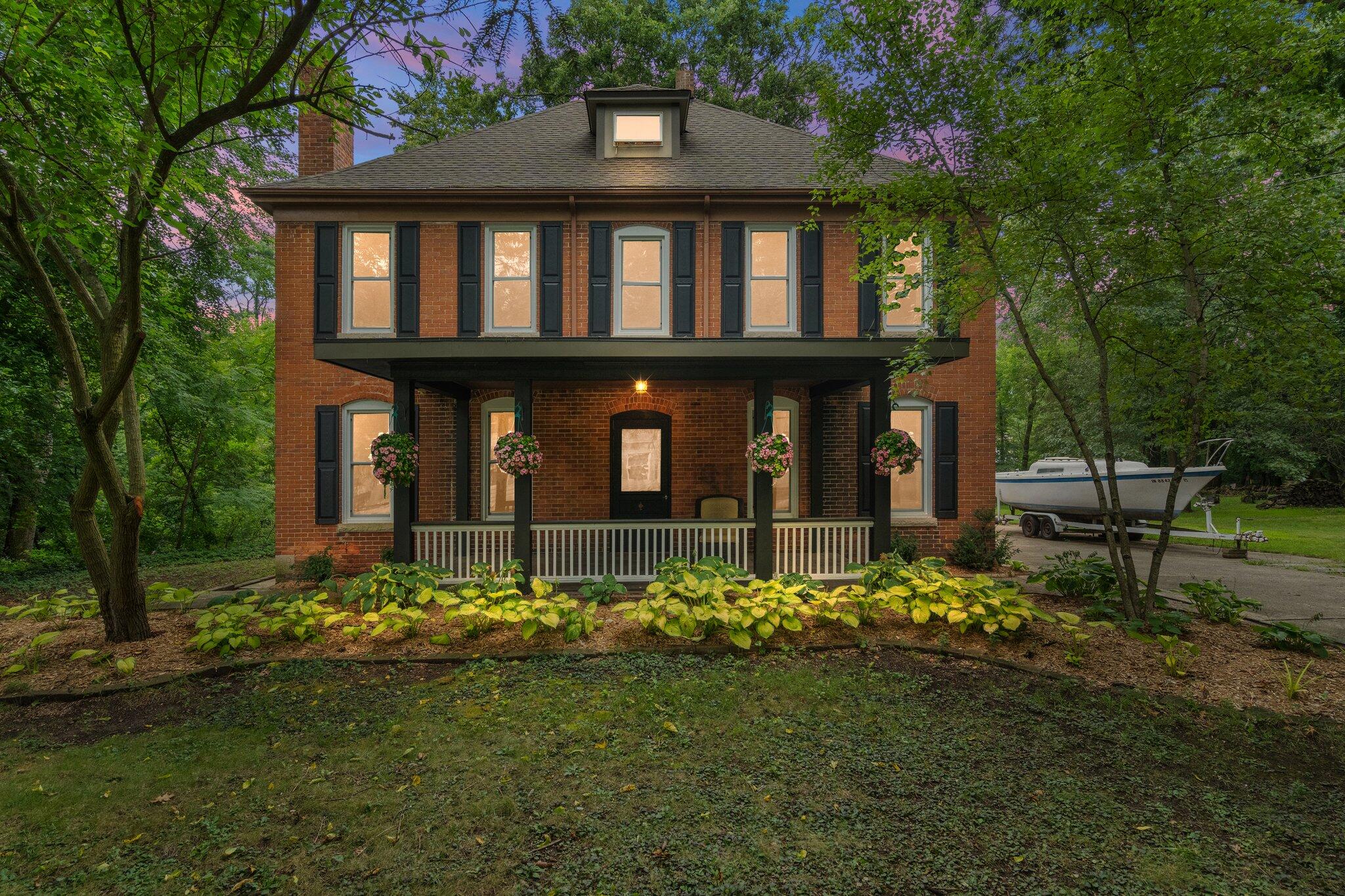 front view of a house with a yard