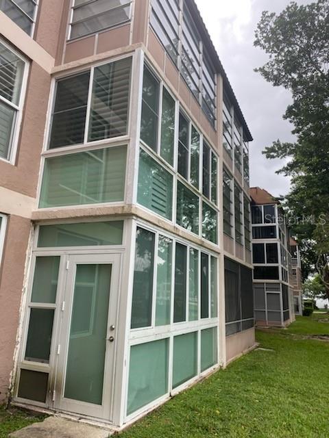 a view of an apartment with a large window